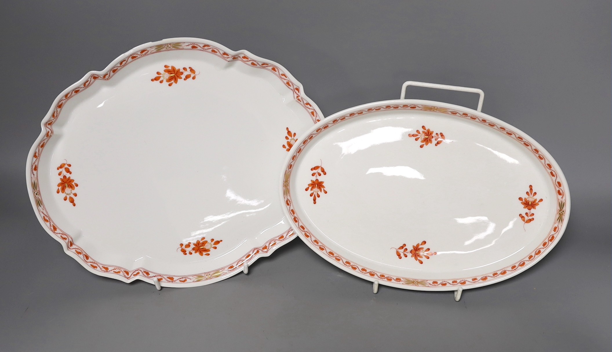 Two Meissen iron red sprig oval trays, largest 27 cms wide